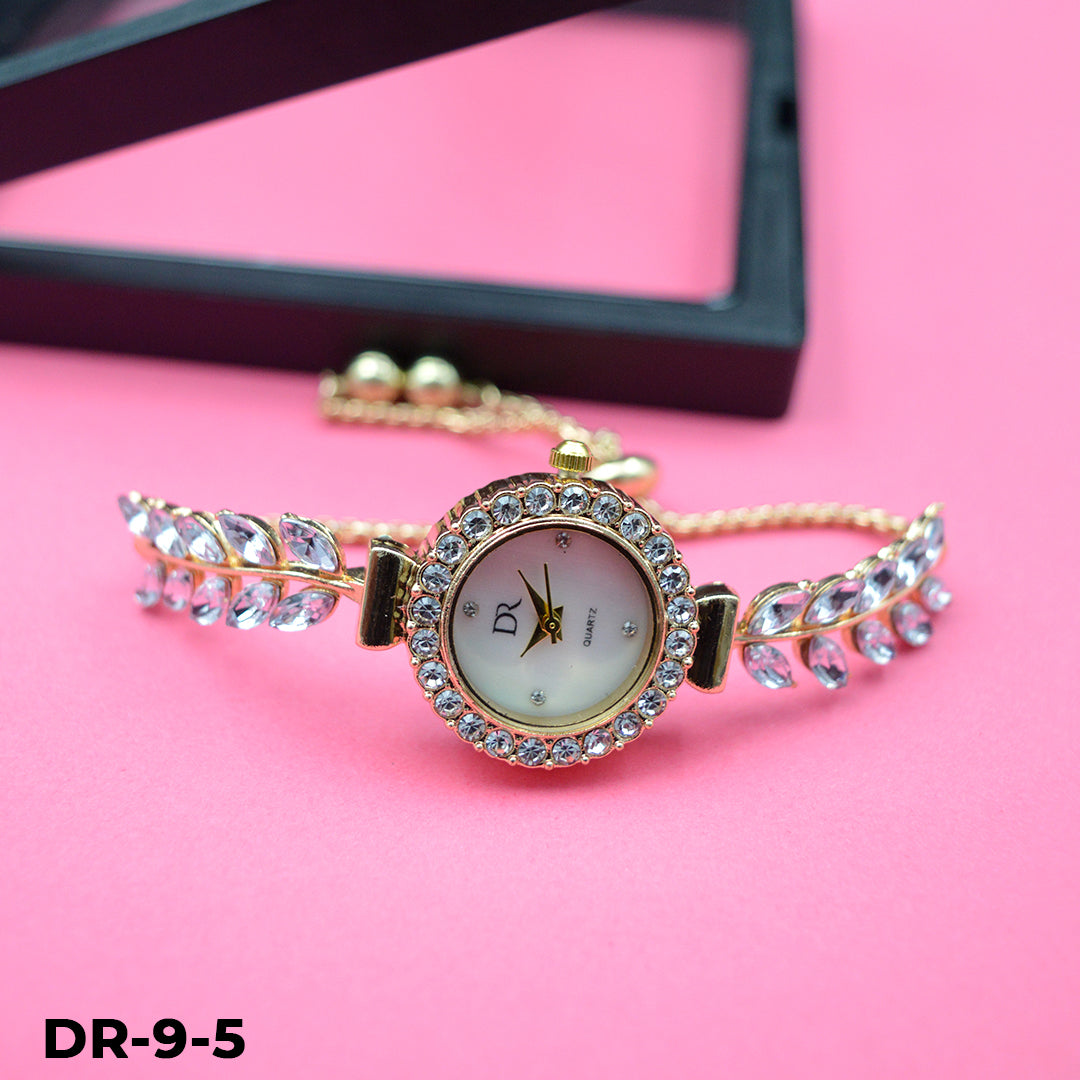 Reloj pulsera tipo joya dorado