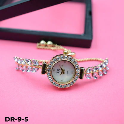 Reloj pulsera tipo joya dorado
